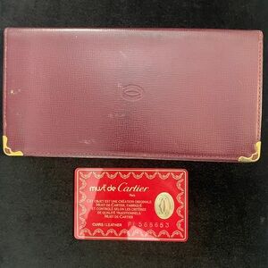 Authentic gorgeous Cartier Wallet with authenticity card. 7 3/4 “ x 4”